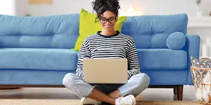 Woman focusing on computer